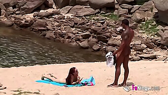 Interracial Couple Enjoys A Beach Day